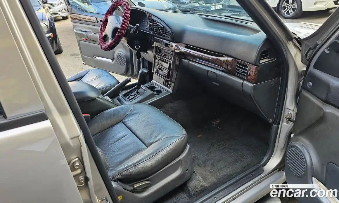 SsangYong Musso 1997 2.3 Автомат в Москве № 34056, фото 11