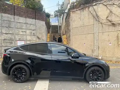 Tesla Model Y 2023 гидро в Москве № 423476, миниатюра 4