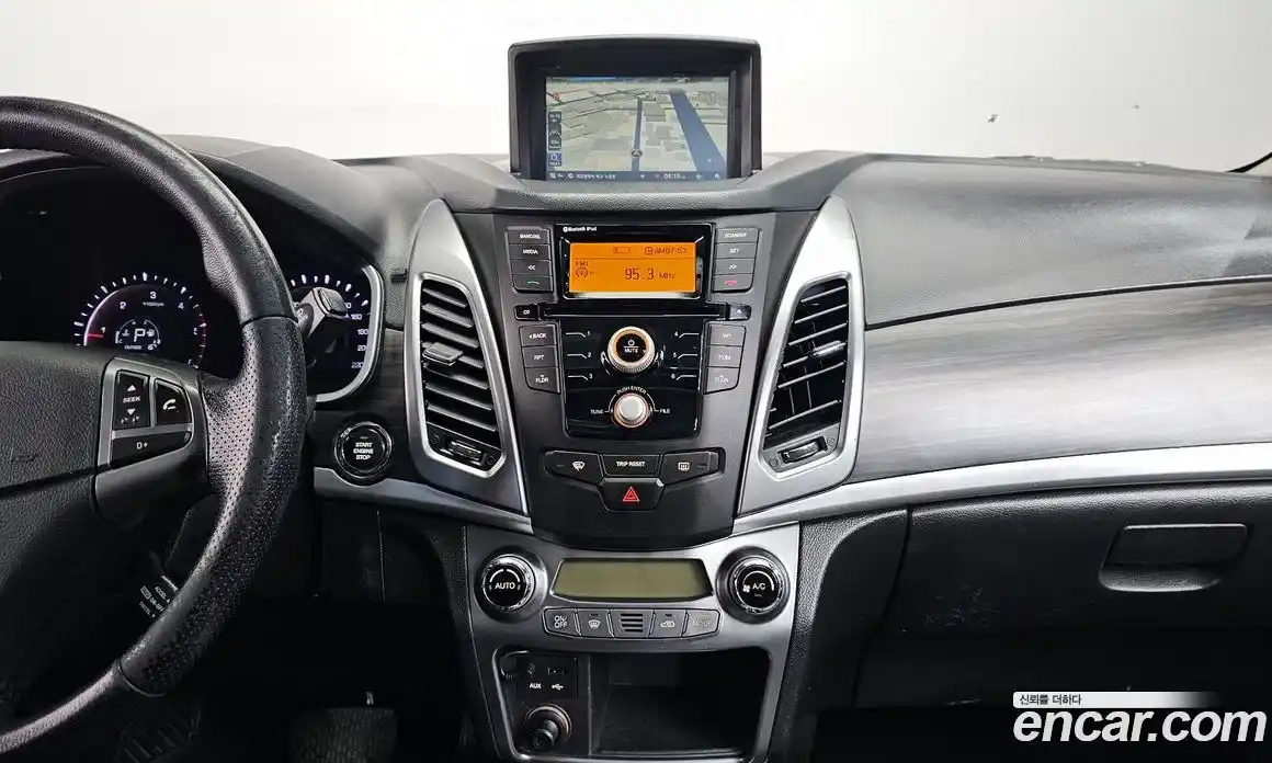 SsangYong Korando 2014 2.0 Автомат в Москве № 1344458, фото 12