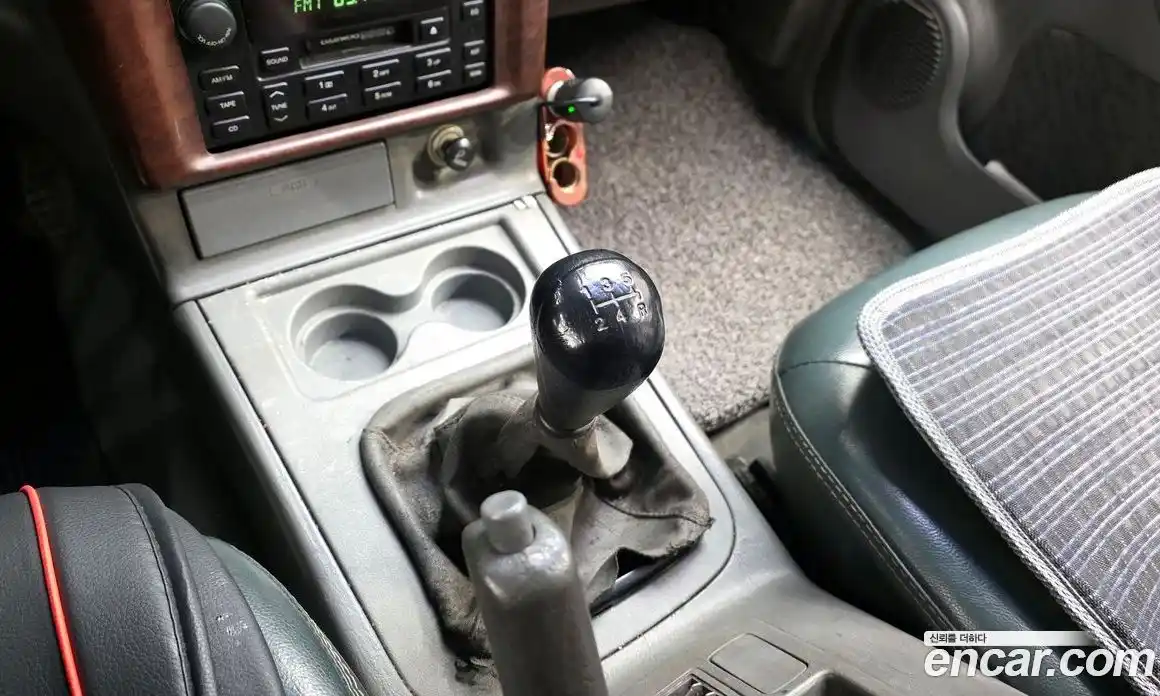 SsangYong Musso 2000 2.3 механика в Москве № 2126936, фото 9