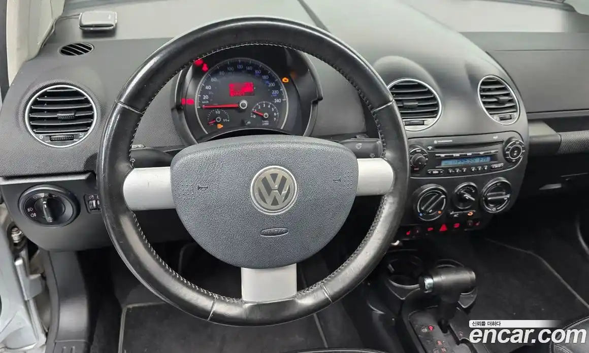 Volkswagen Beatle 2009 2.0 автомат (гидро), фото 12