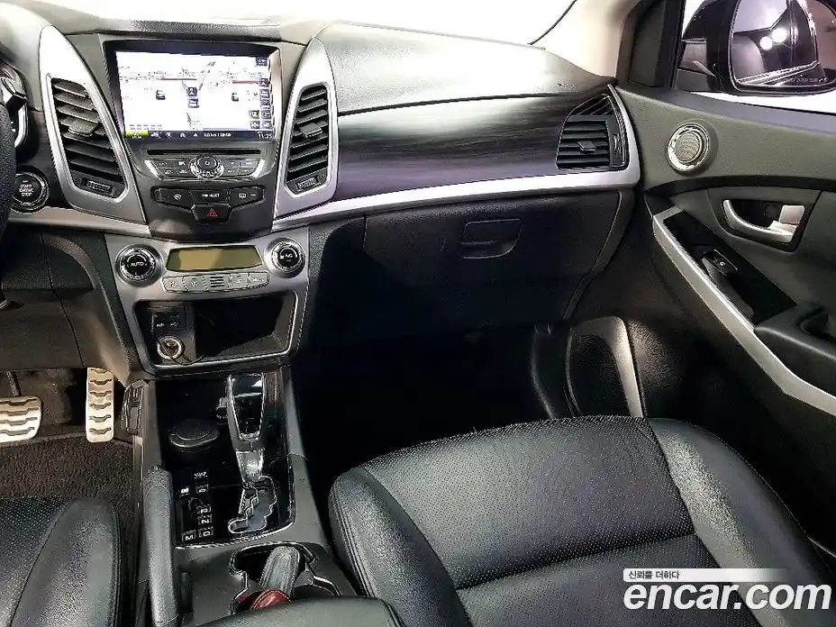SsangYong Korando 2014 2.0 автомат (гидро), фото 9