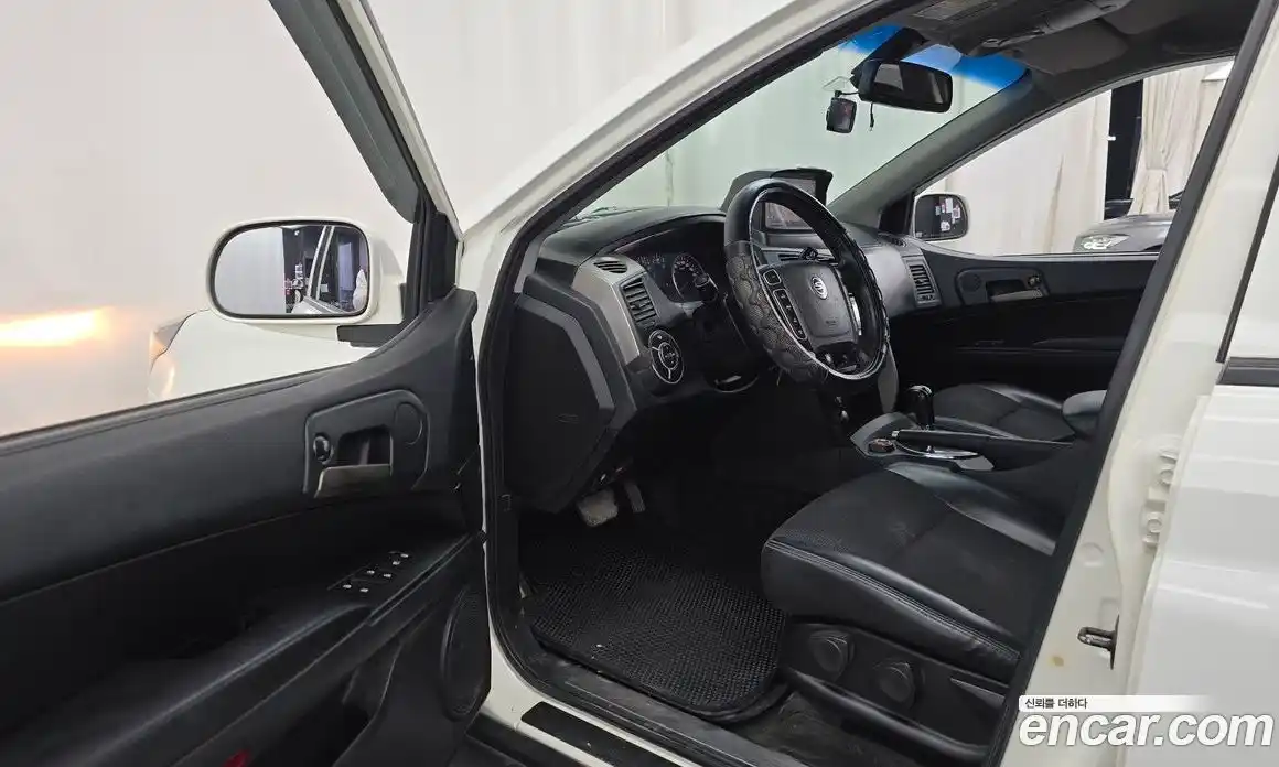 SsangYong Korando 2013 2.0 автомат (гидро), фото 13