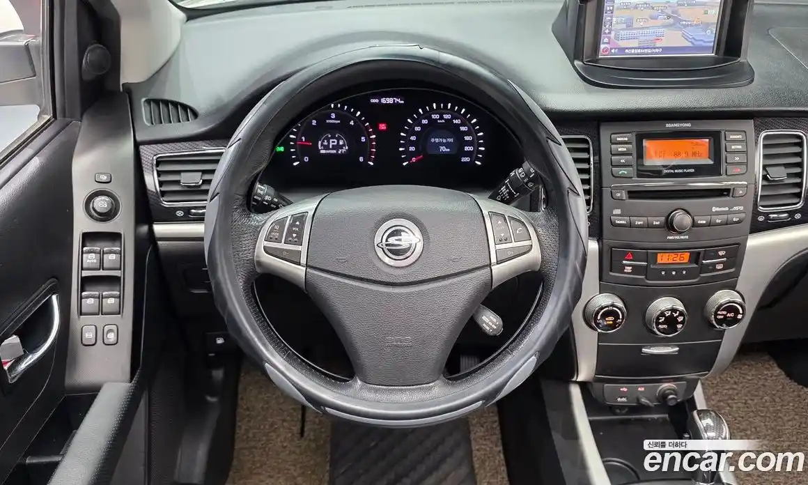 SsangYong Korando 2013 2.0 автомат (гидро), фото 13