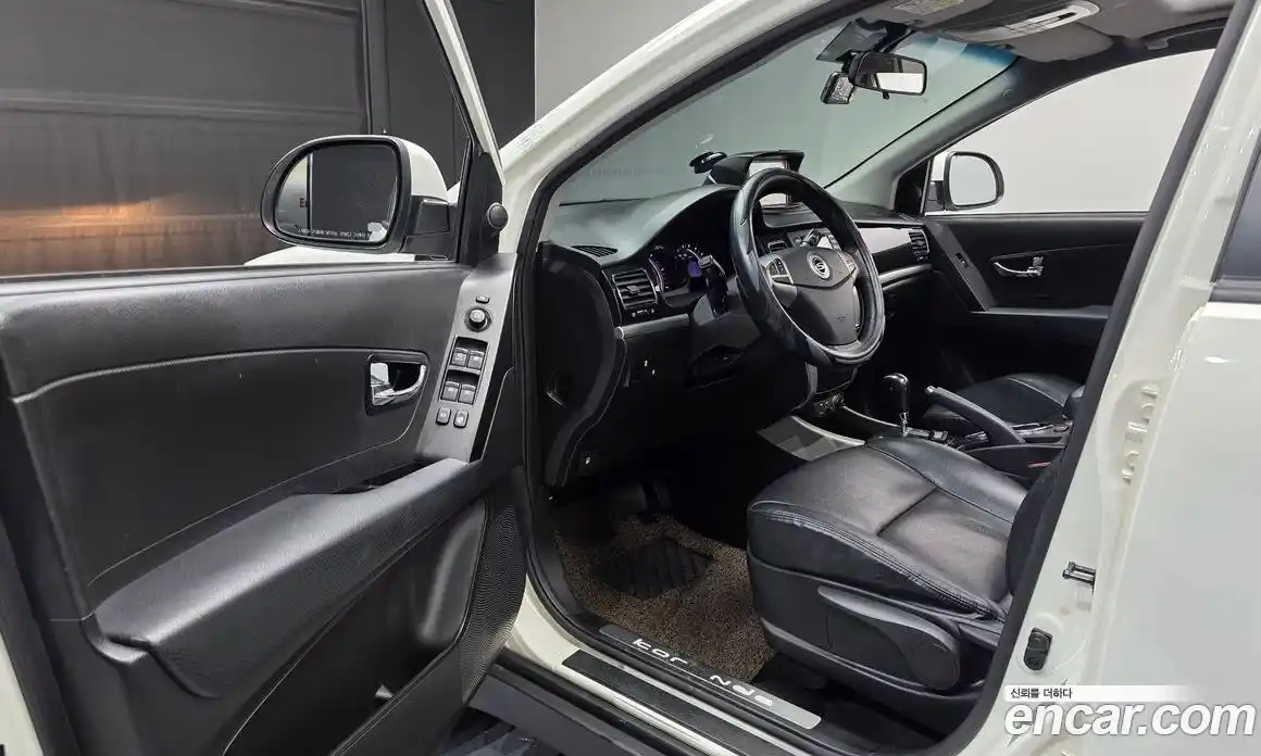 SsangYong Korando 2013 2.0 автомат (гидро), фото 10
