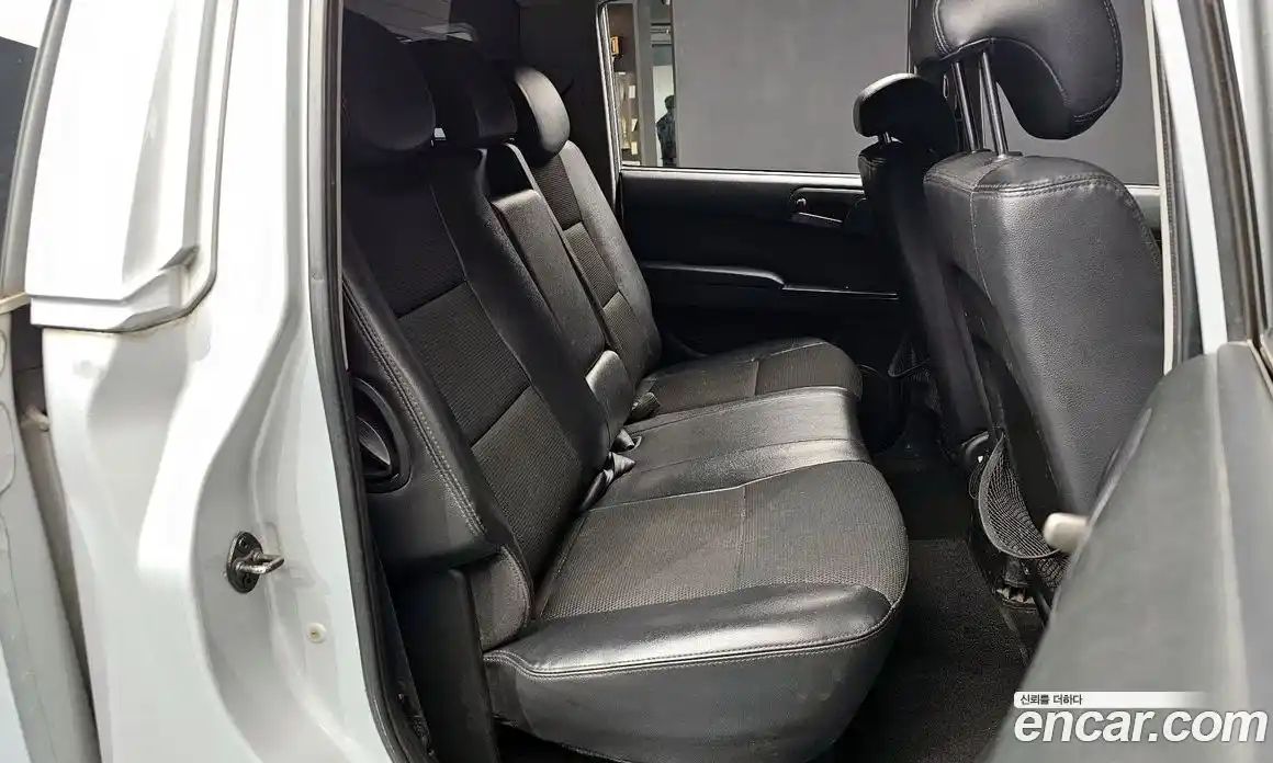 SsangYong Korando 2012 2.0 автомат (гидро), фото 11