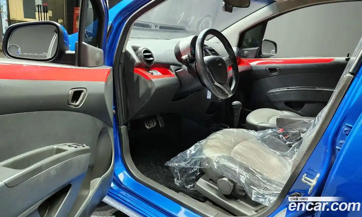 Chevrolet Spark 2011 1.0 автомат (гидро), фото 10
