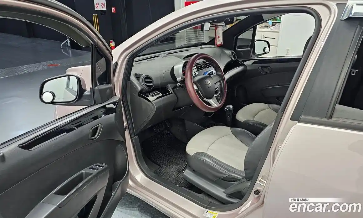 Chevrolet Spark 2011 1.0 автомат (гидро), фото 12