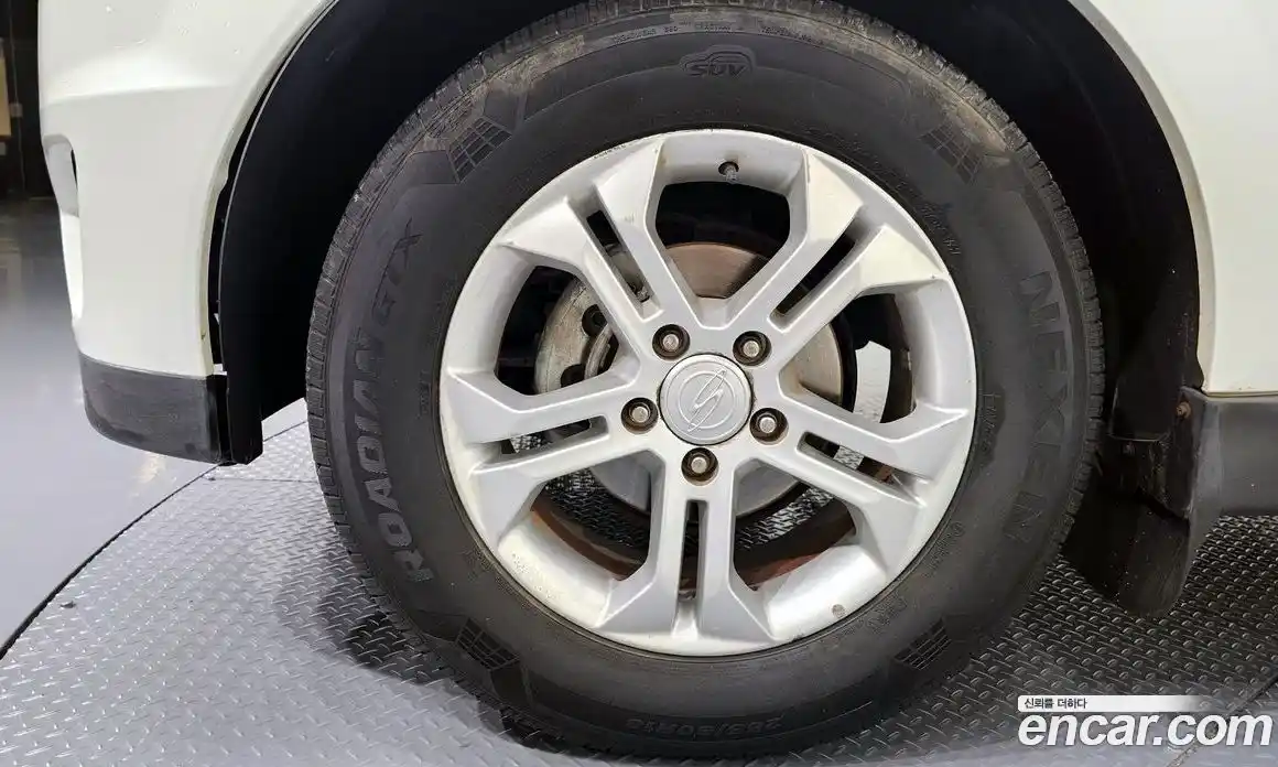 SsangYong Korando 2013 2.0 автомат (гидро), фото 5