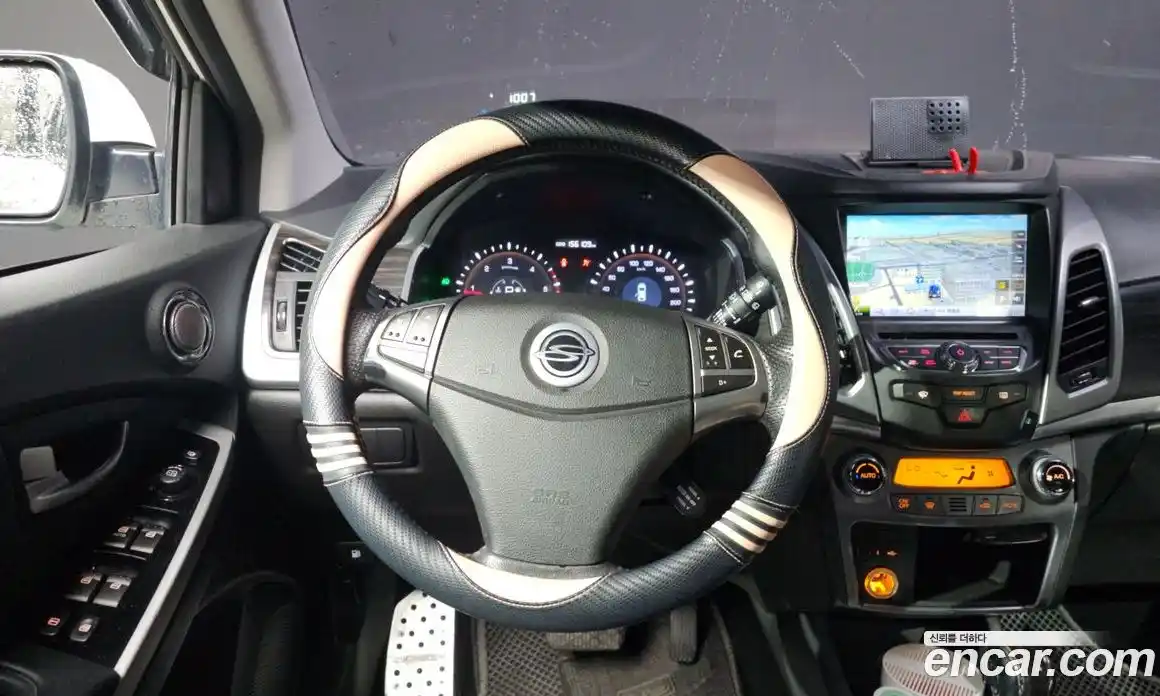 SsangYong Korando 2014 2.0 автомат (гидро), фото 20