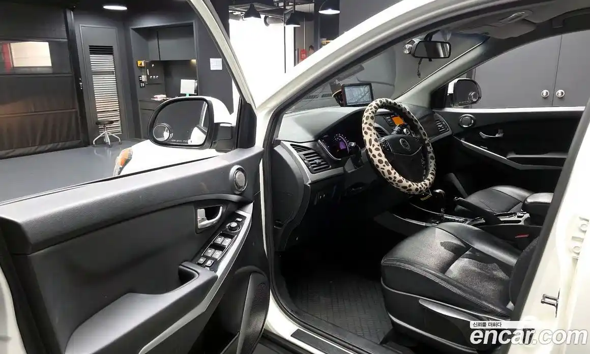 SsangYong Korando 2014 2.0 автомат (гидро), фото 13