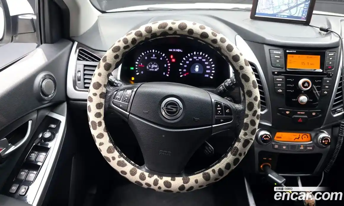SsangYong Korando 2014 2.0 автомат (гидро), фото 19