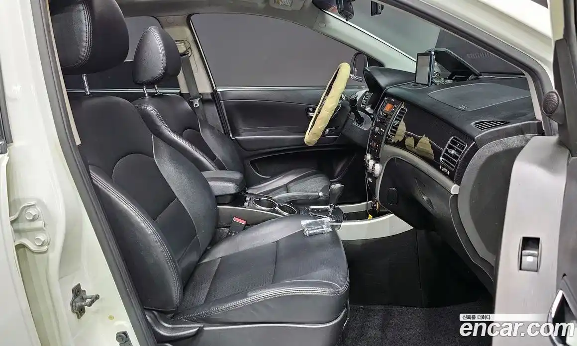 SsangYong Korando 2013 2.0 автомат (гидро), фото 12