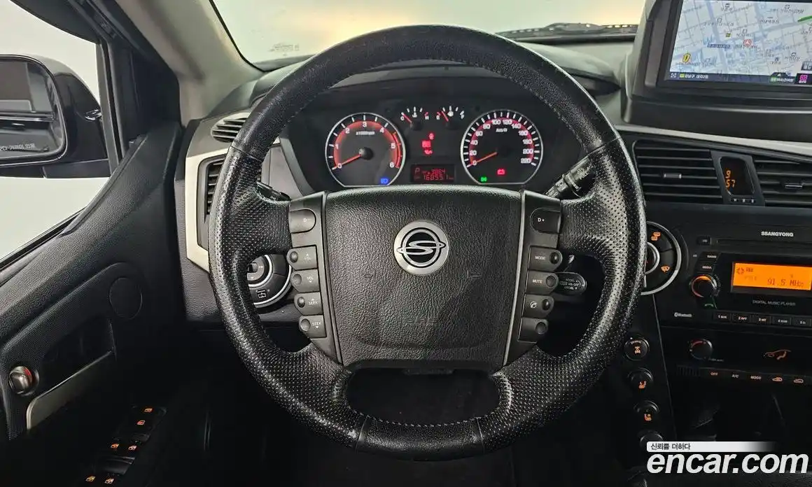 SsangYong Korando 2013 2.0 автомат (гидро), фото 13