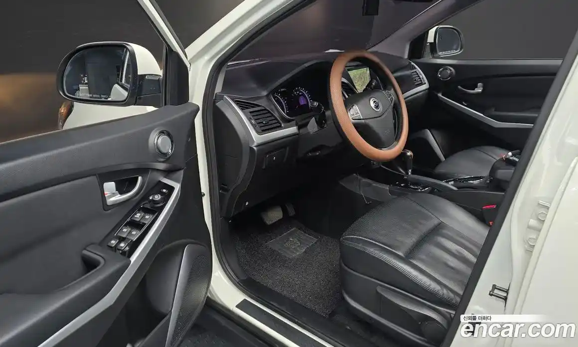 SsangYong Korando 2014 2.0 автомат (гидро), фото 11