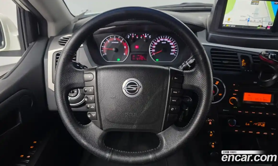 SsangYong Korando 2012 2.0 автомат (гидро), фото 16