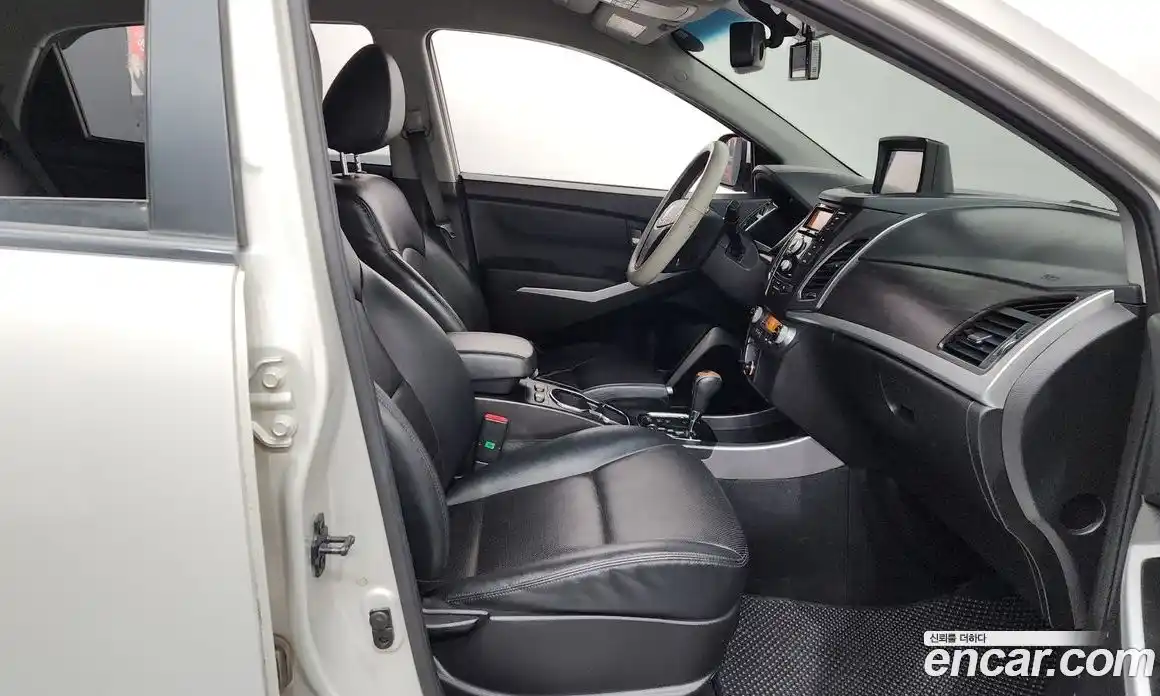 SsangYong Korando 2014 2.0 автомат (гидро), фото 16