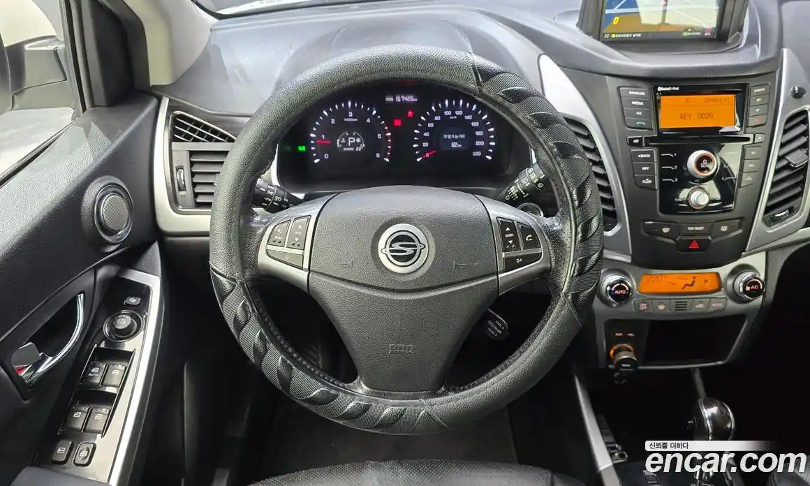 SsangYong Korando 2013 2.0 автомат (гидро), фото 13