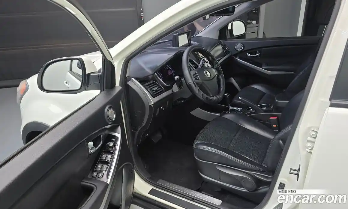 SsangYong Korando 2013 2.0 автомат (гидро), фото 10
