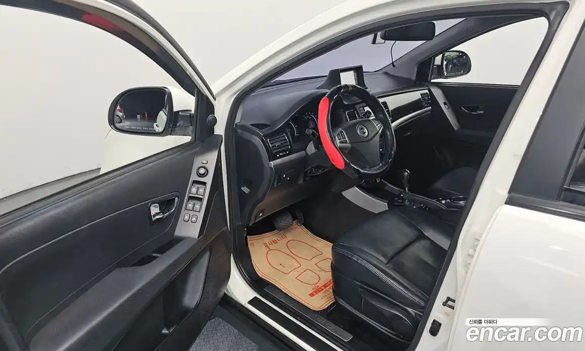 SsangYong Korando 2013 2.0 автомат (гидро), фото 13