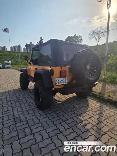 Jeep Wrangler 1997 4.0 автомат (гидро), миниатюра 3