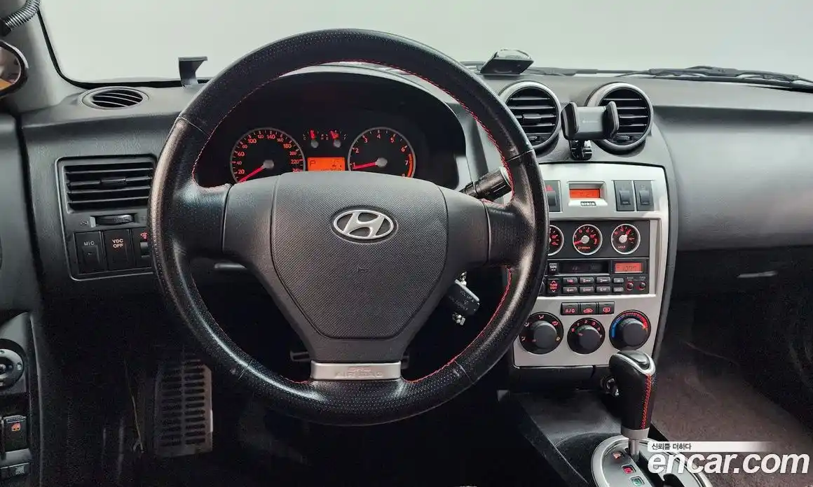 Hyundai Tuscani 2006 2.0 автомат (гидро), фото 13