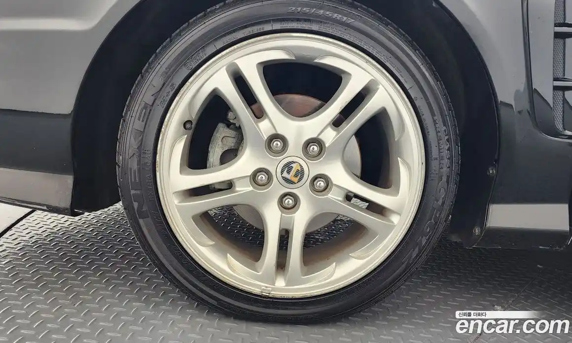 Hyundai Tuscani 2006 2.0 автомат (гидро), фото 5