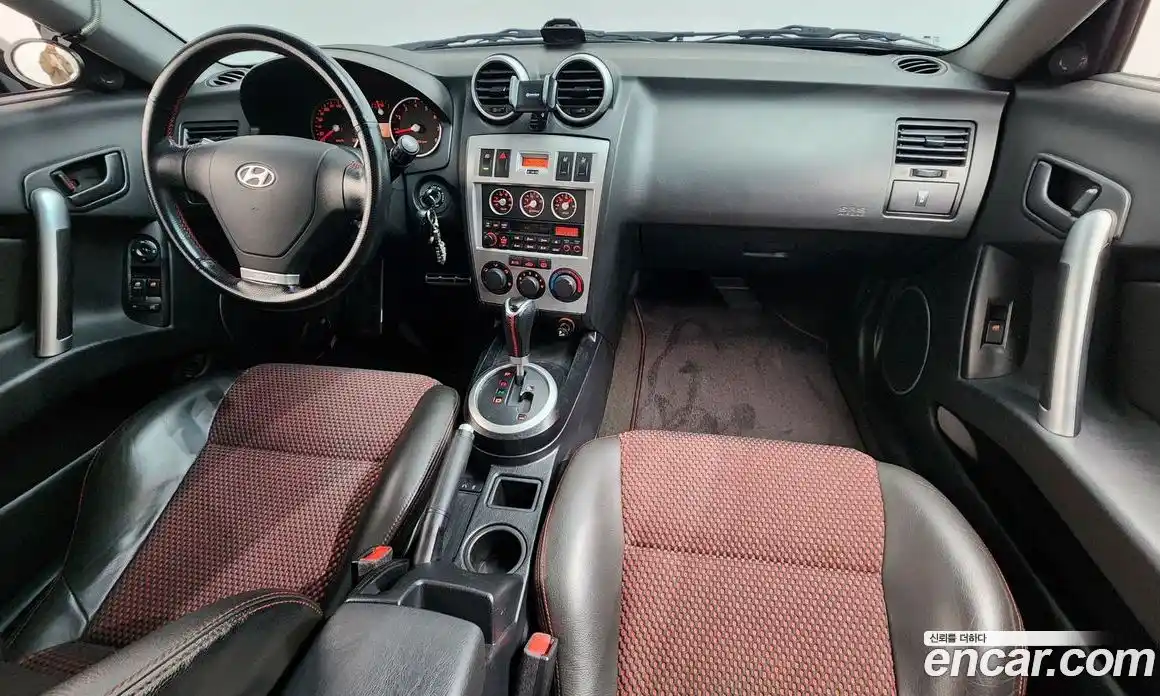 Hyundai Tuscani 2006 2.0 автомат (гидро), фото 7