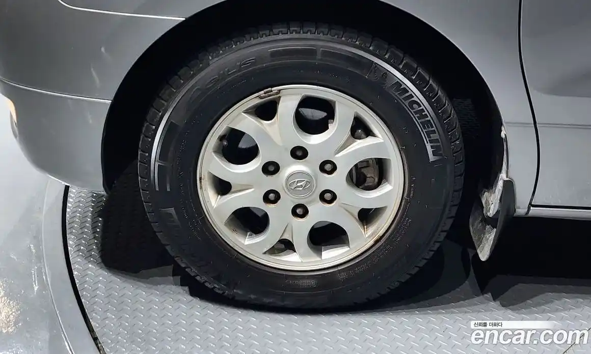 Hyundai Starex 2010 2.5 автомат (гидро), фото 5