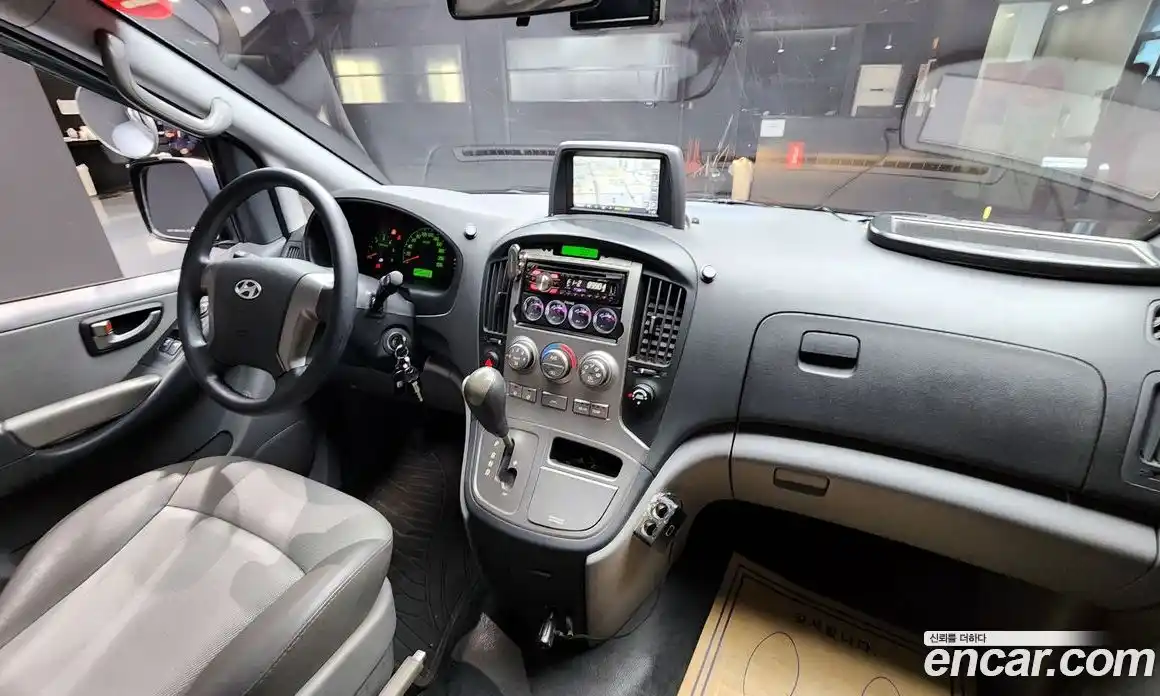 Hyundai Starex 2010 2.5 автомат (гидро), фото 7