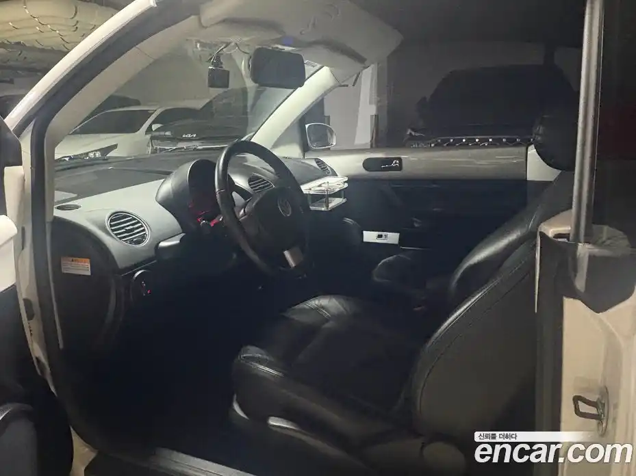 Volkswagen Beatle 2009 2.0 автомат (гидро), фото 11