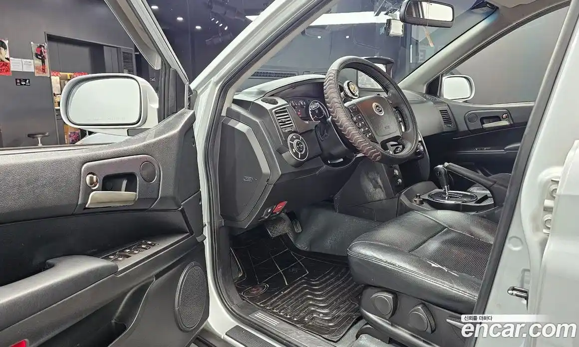 SsangYong Korando 2012 2.0 автомат (гидро), фото 13