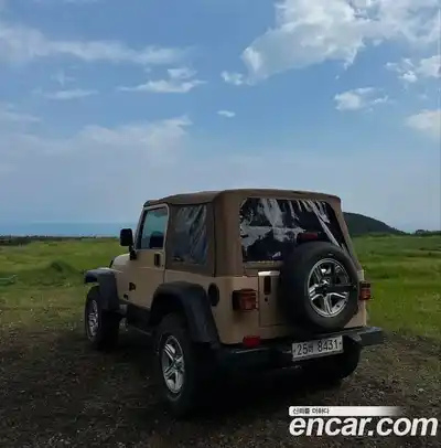 Jeep Wrangler 1997 4.0 автомат (гидро), миниатюра 2