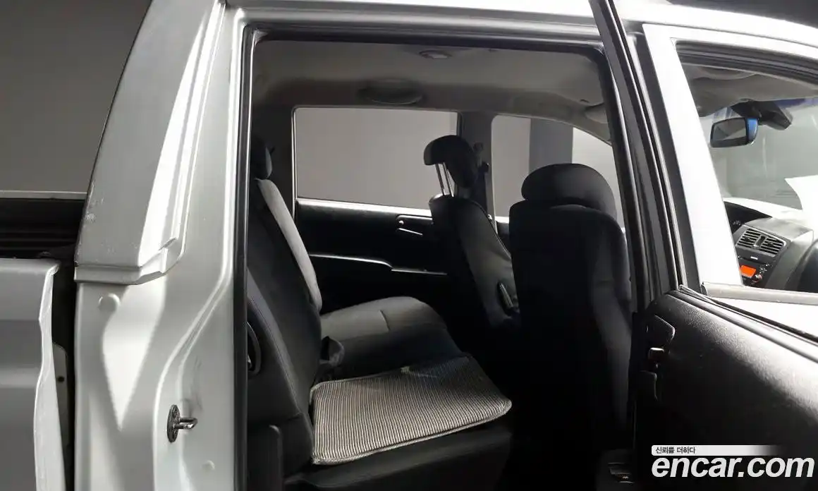 SsangYong Korando 2012 2.0 автомат (гидро), фото 12