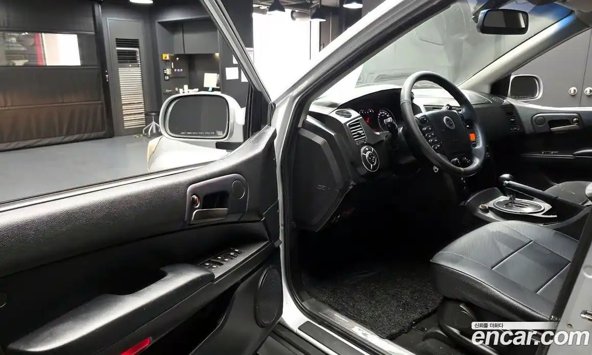 SsangYong Korando 2012 2.0 автомат (гидро), фото 10