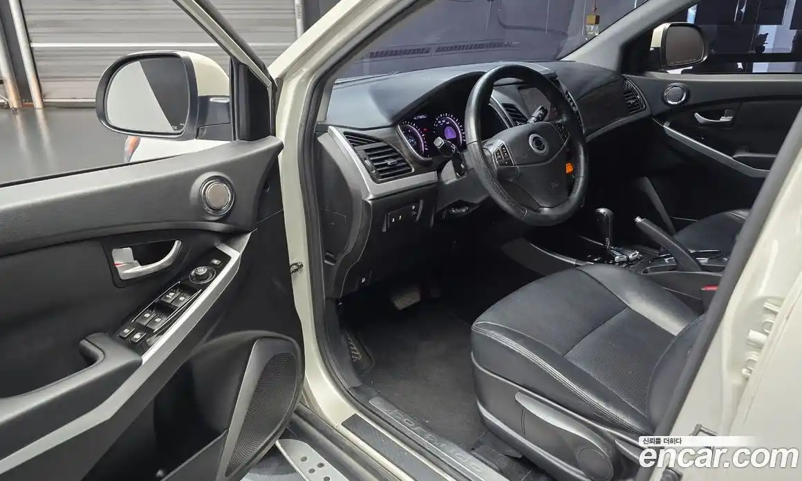 SsangYong Korando 2014 2.0 автомат (гидро), фото 11