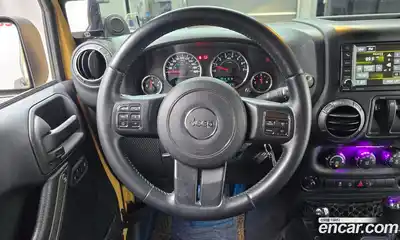 Jeep Wrangler 2013 3.6 автомат (гидро), миниатюра 12