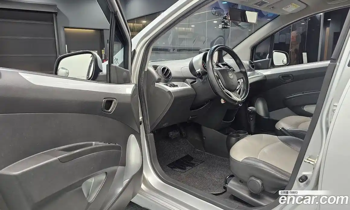 Chevrolet Spark 2011 1.0 автомат (гидро), фото 13