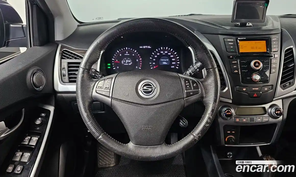 SsangYong Korando 2014 2.0 автомат (гидро), фото 14