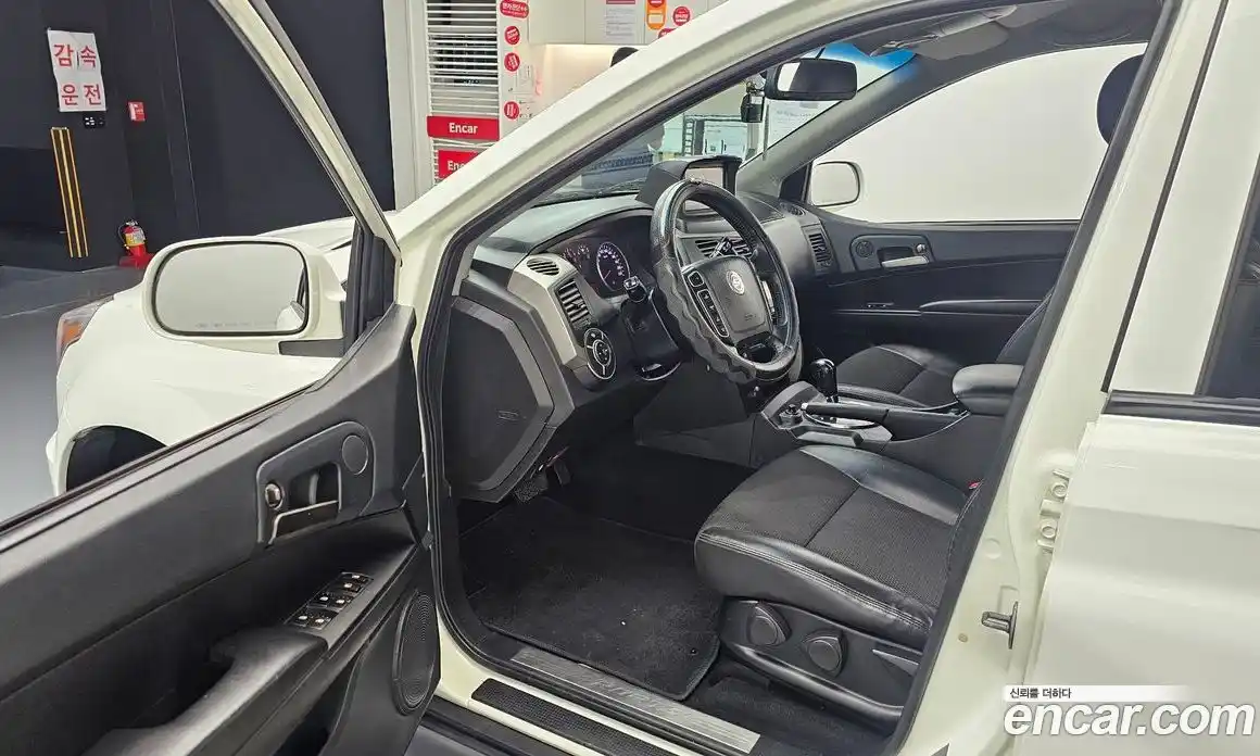 SsangYong Korando 2013 2.0 автомат (гидро), фото 10