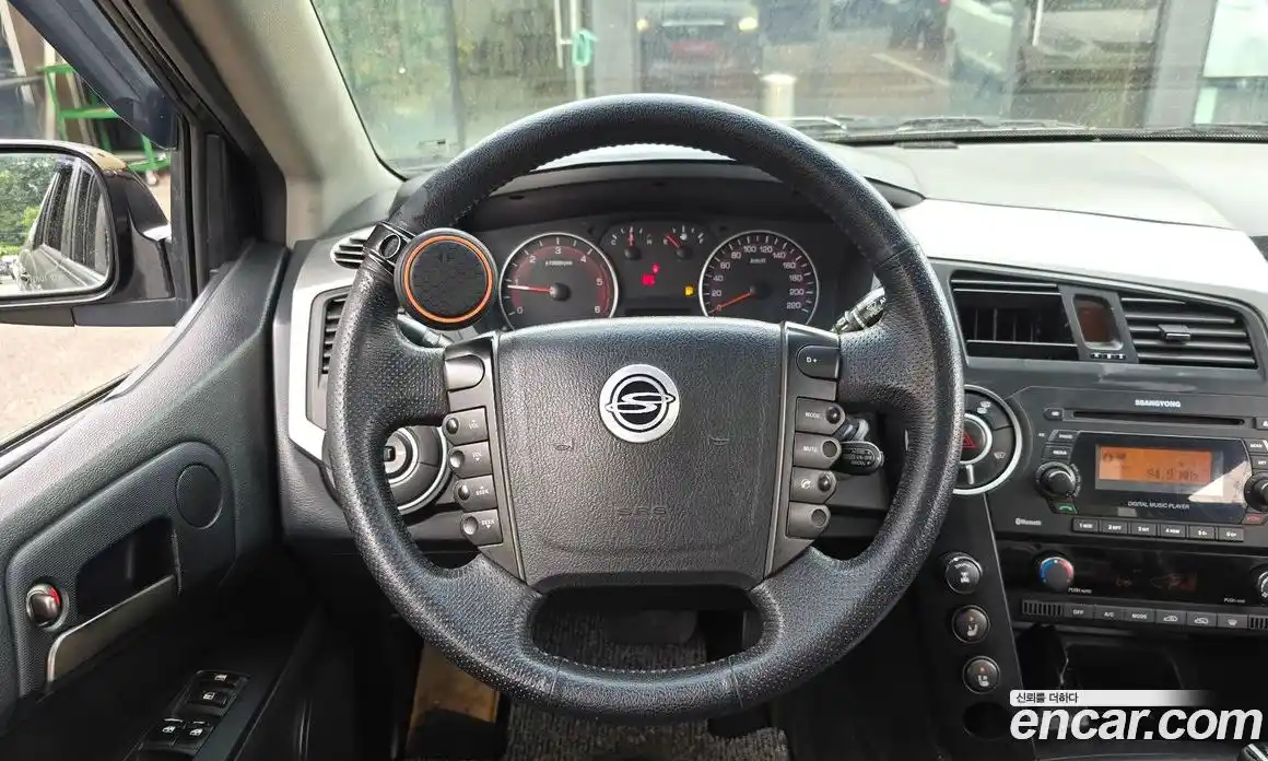SsangYong Korando 2012 2.0 автомат (гидро), фото 13
