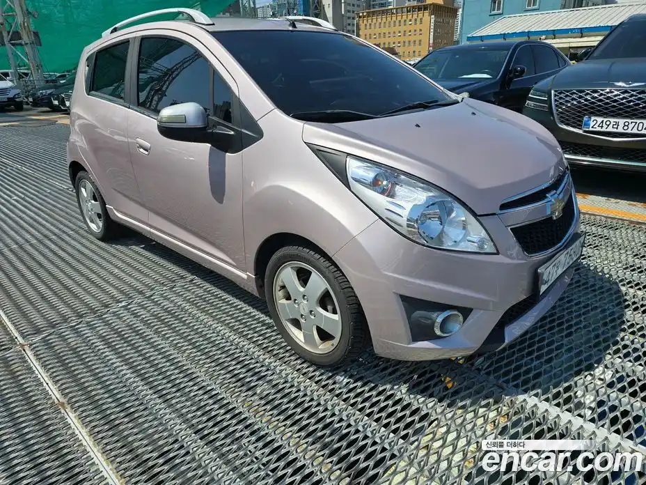 Chevrolet Spark 2011 1.0 автомат (гидро), фото 1