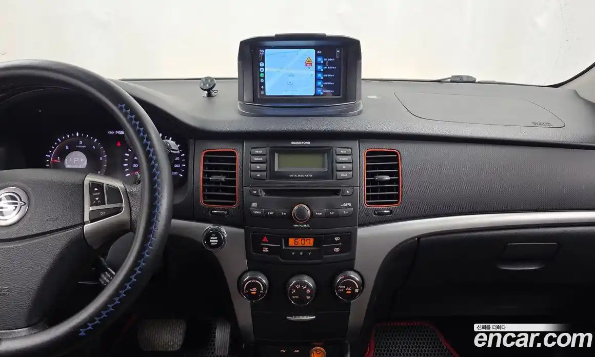 SsangYong Korando 2011 2.0 автомат (гидро), фото 14