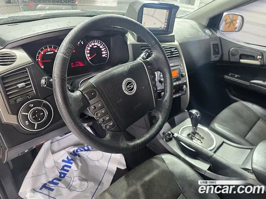 SsangYong Korando 2012 2.0 автомат (гидро), фото 18
