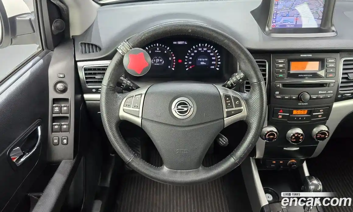 SsangYong Korando 2012 2.0 автомат (гидро), фото 13