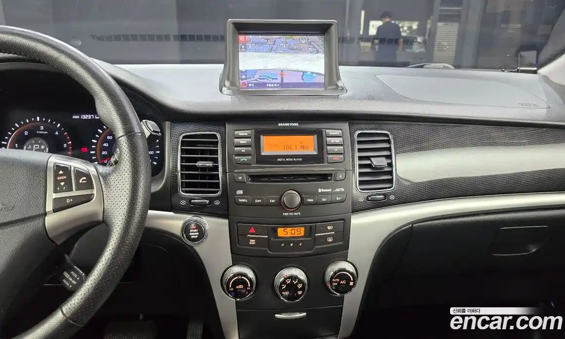 SsangYong Korando 2012 2.0 автомат (гидро), фото 14