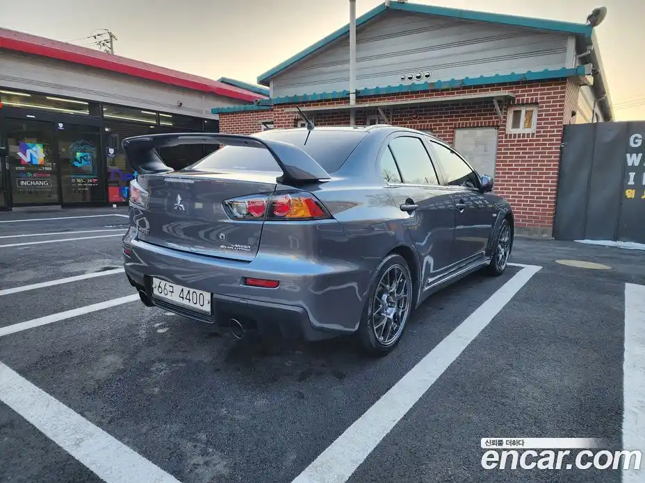 Mitsubishi Lancer Evolution 2009 2.0 автомат (гидро), фото 2 Mitsubishi Lancer Evolution 2009 2.0 автомат (гидро), фото 2
