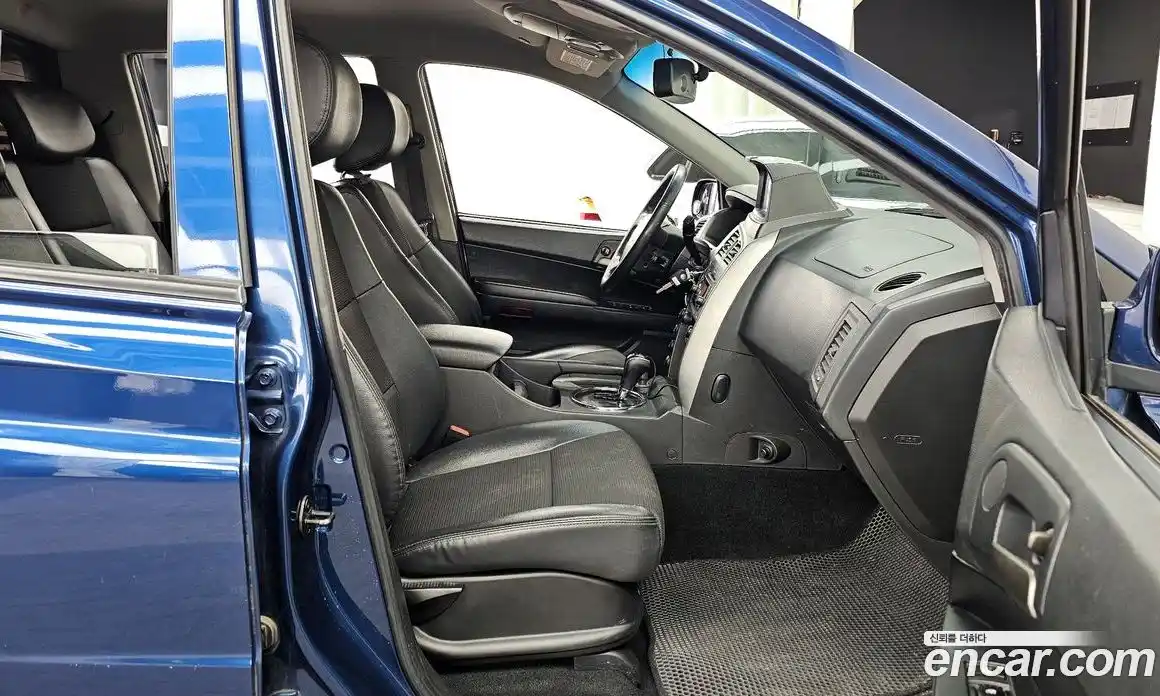 SsangYong Korando 2014 2.0 автомат (гидро), фото 11