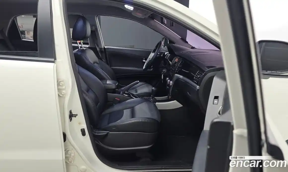 SsangYong Korando 2013 2.0 автомат (гидро), фото 16