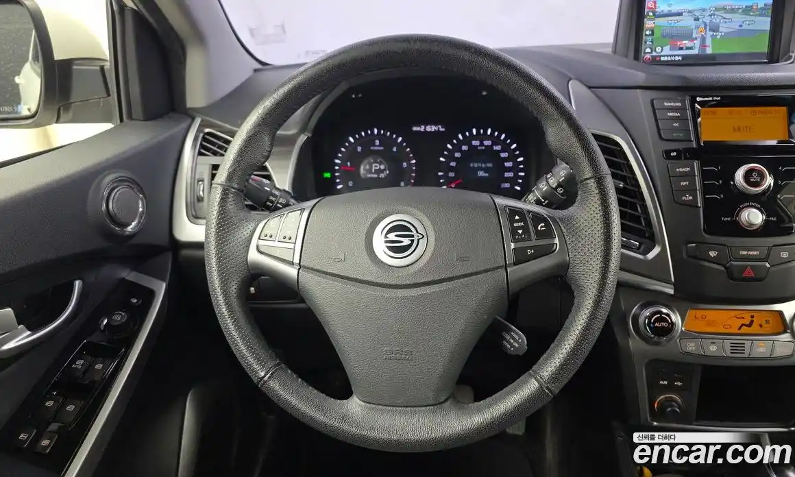 SsangYong Korando 2013 2.0 автомат (гидро), фото 13